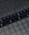 Close-up of ruler markings on Workhorse Heavy Duty 12 Inch Paper Cutter For Office And Crafts With Safety Guard And Blade Lock, Portable Guillotine Trimmer