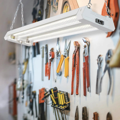 2 Ft LED Shop Light Fixture For Garage And Workshop, 20W, 2500 Lumens, 5000K Daylight, Clear Lens, Hanging Over Tools