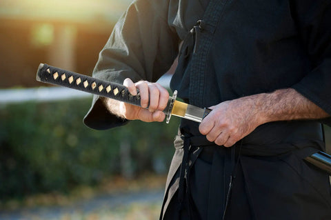 Unsharpened Aluminum Alloy Wakizashi Iaito For Iaido Training Sword With A 21 Inch Blade And Fuller Groove in hands for practice