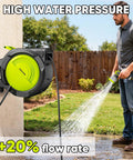 Man using Heavy Duty Automatic Wall Mount Garden Hose Reel With 160 Feet Of Kink Free Auto Rewind Hose in garden