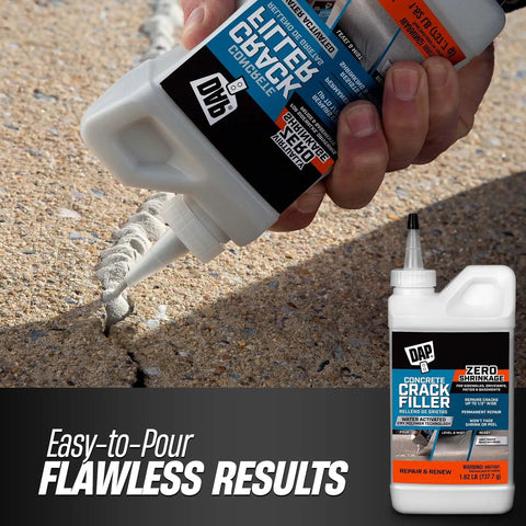 Fast Drying Concrete Crack Filler for Indoor and Outdoor Surfaces DIY Friendly Permanently Fills Cracks In Concrete Stone and Masonry 1.62 Lbs With Chemical Resistant Gloves being applied to a concrete surface.