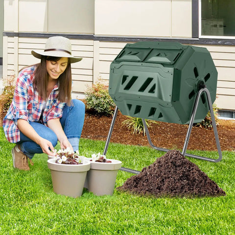 Woman using Outdoor 42 Gallon Dual Chamber Compost Tumbling Bin With 360 Degree Rotating Barrel on lawn with metal frame