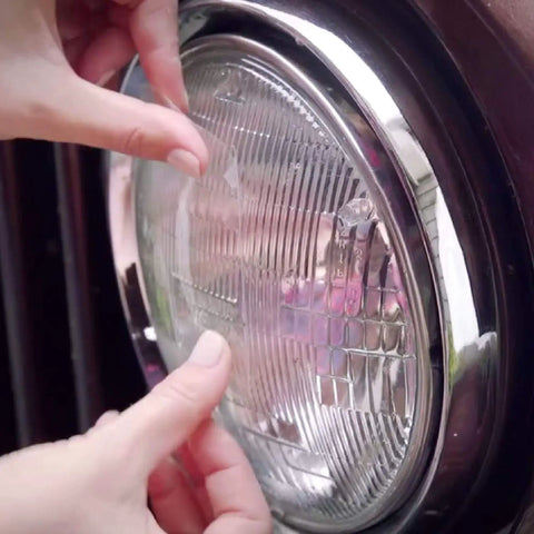 Applying Crystal Clear Duct Tape 1.88 Inch By 5 Yard Heavy Duty All Purpose Tape Weatherproof And Airtight Tear By Hand to headlight