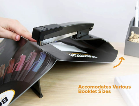 No Jam Booklet Stapler For 20 Sheets, All Metal Construction, binding a booklet on a wooden desk