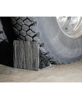 Built Tough Laminated Wheel Chock 8 Inch By 8 Inch By 8 Inch For Trucks And Trailers With Welded Ring in use with a truck tire