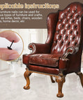 Top Shelf Black Round Head Upholstery Tacks 200 Pack 7X13Mm Metal Thumb Pins With Handy Storage Case on a leather chair.