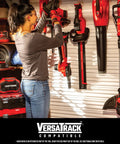 Woman organizing Cordless 20V Max Weed Wacker And Leaf Blower Combo Kit With Battery And Charger Included For Quick Yard Cleanup on wall