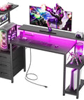 48 Inch Gaming Desk Setup With LED Lights And Power Outlets Computer Desk With Fabric Drawers And Side Hook Reversible Gamer Table