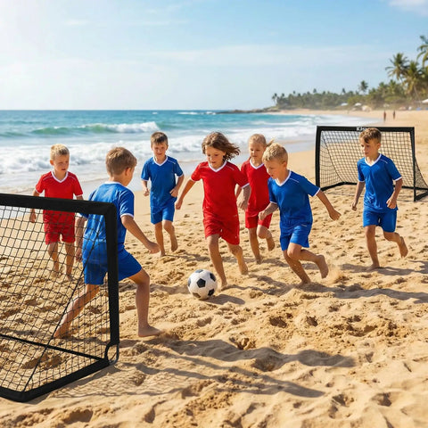 Children playing soccer on a beach with a Backyard Pop Up Soccer Goals Set of 2 for Kids, 4x3ft Training Nets With Soccer Ball, Black.