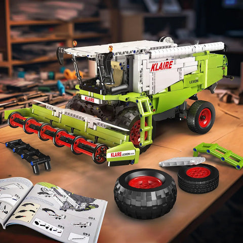 Claas Lexion 760 Remote Controlled Combine Harvester Building Blocks Kit MOC with assembly manual on wooden table