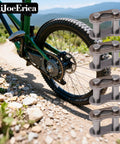 Sturdy Carbon Steel Bike Chain Master Link Connector Kit, 6 Pack Quick Links next to bike on rocky trail, easy install, rust-resistant.