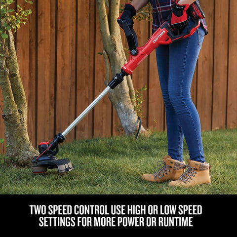 Cordless 20V Max Weed Wacker And Leaf Blower Combo Kit With Battery And Charger Included For Quick Yard Cleanup Lightweight String Trimmer being used to trim grass near a tree.