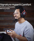 Person gaming with Cloud Alpha Wireless Gaming Headset For PC With 300 Hour Battery Life And DTS Headphone X Spatial Audio