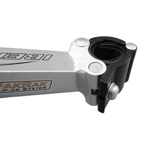 Close-up of seatpost mounted rear bike rack with quick release for 26 inch and 700c frames, lightweight anodized aluminum.