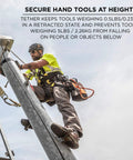 Worker using the Squids 3011 Retractable Tool Lanyard with Carabiner Mount for safety while securing tools at height.