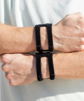 Adjustable Wrist Brace For TFCC Tears on both wrists, showcasing the versatility, water-friendly feature for all-day sports comfort.