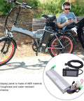 Low Noise Quiet Running 24V 36V 48V Brushless Motor Controller With LCD Display For Ebike Conversion Kit Dual Drive Braking Reversing And Speed Control Efficient Heat Dissipation Easy Install shown with a man resting on a bench beside an electric bike.