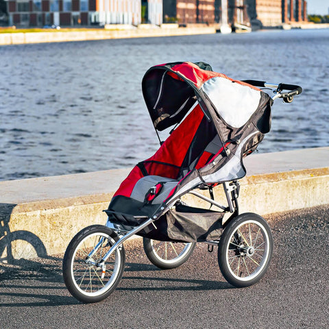 Jogging stroller with Rear 16x1.75 Tire And Inner Tube Set for Revolution Pro Flex SE Ironman, Stroller Strides models by a river.