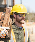 Construction worker wearing MX350 Clear Anti Fog Safety Eyewear with Gas Resistant Neoprene Strap and hard hat outdoors