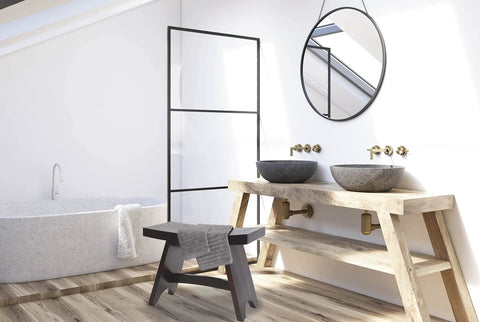 Modern bathroom with a black 24-Inch Teak Shower Bench With Anti-Slip Flared Legs And Adjustable Foot Pads, placed beside a large bathtub.