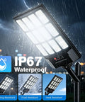 Heavy Duty 4 Pack Solar Street Lights Outdoor Waterproof Rock Solid Motion Sensor Floodlights in rain, showcasing IP67 waterproof rating.