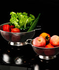 Stainless Steel Colander 3 Quart Strainer with fresh vegetables and fruits, ideal for kitchen food prep, dishwasher safe