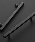 30 Pack Square Cabinet Pulls Matte Black Stainless Steel For Kitchen Cabinets And Dressers on black background.