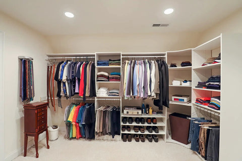 Top Shelf 6 Inch LED Recessed Downlights With Adjustable Color Temperature illuminating a well-organized closet with clothes.