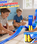 Children playing with 16 Foot Flexible Race Track Set For Kids With Roll Up DIY Lanes, Dual Track, 2 Launchers, 6 Mini Cars indoors