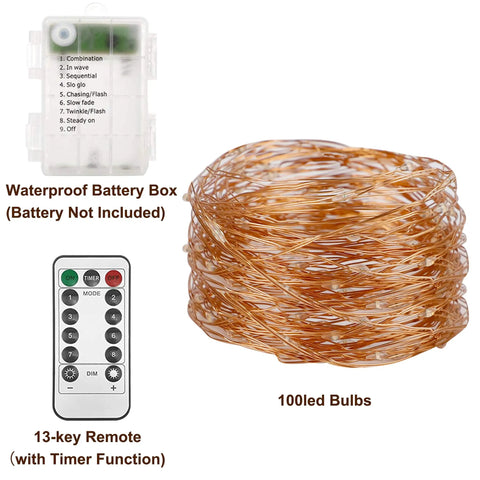 St Patrick's Day Green Fairy Lights Battery Operated 33ft 100 LED Silver Wire With Remote 8 Modes Waterproof Indoor Outdoor String Lights For Tree Wedding Party Decor, showing battery box, 13-key remote, and coiled string lights.