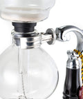 Close-up of Three Cup Tabletop Siphon Coffee Maker With Alcohol Burner Gravity Brew For Clean Rich Smooth Coffee And Aromas Safe Sleek Stand