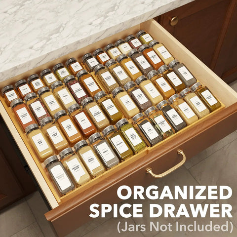 No Sweat Adjustable Bamboo Spice Drawer Organizer Expands To Fit Any Kitchen Cabinet Slot with organized jars in drawer.