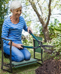 Woman using Heavy Duty Garden Kneeler And Seat With Large Four Pocket Tool Bag Flip Up Bench For Kneeling Or Sitting Thick Durable Frame