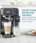 Top Shelf Hassle Free One Touch Espresso And Latte Brewer With Built In Frother, sleek design, glass mug with layered latte.