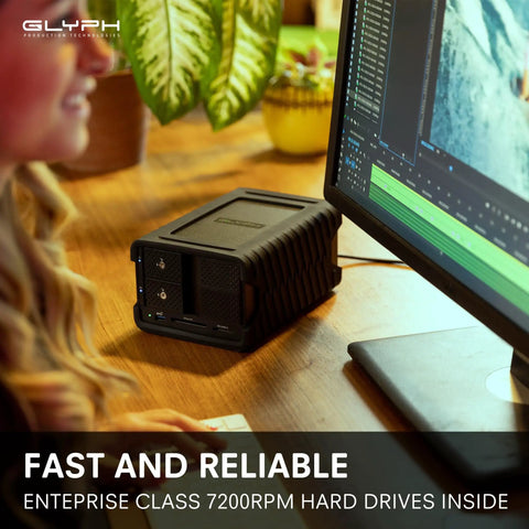 32TB RAID Thunderbolt 3 Desktop Storage With Dual 16TB Drives, USB C Gen 2 Support, Mac And Windows Ready For 8K Filmmaking And VFX, Beast Pro Grade Storage With Certified Cables For Seamless Setup on a desk beside a monitor
