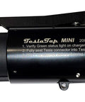 Slick Tesla To J1772 Adapter Sixty Amp Plug And Play Setup showing sturdy black design with instruction text for use.