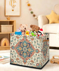 Straight Up 13 Inch Foldable Cube Storage Bin With Heavy Duty Handles For Closet Organization And Nursery Supplies Waterproof Flower Pattern Basket filled with toys.