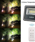 JUDYSSY 30W Led Solar Powered Flood Lights showing remote control and three color temperature options outdoors.