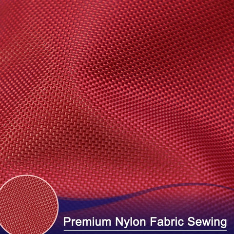 Close-up of red nylon fabric texture, part of Heavy Duty 4x6 Outdoor Nylon US Flag With Embroidered Stars Sewn Stripes Brass Grommets