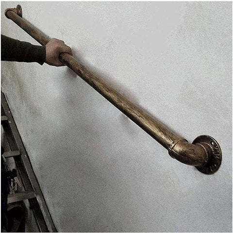 Top Notch Industrial Wrought Iron Pipe Banister Stair Handrail In Antique Brass Finish Featuring Gritty Galvanized Steel Build Built Tough For Indoor Outdoor Hallway And Porch Deck Railing Upgrades with hand gripping