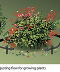 Illustration showing drip irrigation repair and expansion kit with 102 universal parts and 100 ft tubing in use around plants.