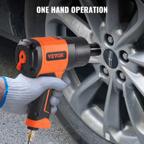 Half Inch Air Impact Wrench With 1400 Ft-Lbs Torque, Ultra Lightweight 4.6 Lbs, Twin Hammer used on a car wheel