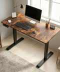Top Shelf 48X24 Inch Rustic Brown Electric Standing Desk With Reinforced Double Beam Frame For Hella Solid Build And Smooth Height Adjustments Without Wobble For Gaming Or Office Setup, viewed from above, with monitor and keyboard.