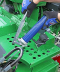 Person using SKF Lever Action Grease Gun Be A Beast For Your Rig Pro Grade Heavy Duty Workhorse With Durable Steel Build