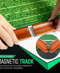 Hands assembling magnetic track on Indoor Putting Green With Auto Ball Return Pro Grade True Roll Mat At 10-11 Stimp Dual Precision Holes