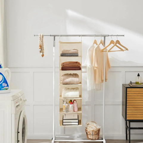 Six Tier Hanging Closet Organizer Shelf With Cloth Fabric And Two Sturdy Hooks Foldable Beige Storage Solution displayed with clothes