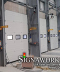 Heavy Duty Led Loading Dock Swing Arm Light 2 Pack mounted to loading dock doors for bright industrial lighting.