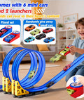 Child playing with 16 Foot Flexible Race Track Set For Kids With Roll Up DIY Lanes, Dual Track, 2 Launchers, 6 Mini Cars