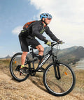 Man riding 7 Speed Mountain Bike 26 Inch Dual Suspension MTB For Men Women Adults, Heavy Duty High Carbon Steel Frame in mountains.