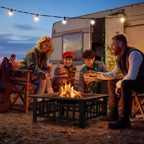 Group enjoying campfire with 32 Inch Fire Pit Table Metal Outdoor Fire Pit With Waterproof Cover For Patio And Camping Black 3 In 1 Design Ideal For Backyard Warmth And Chill Outdoor Hangouts